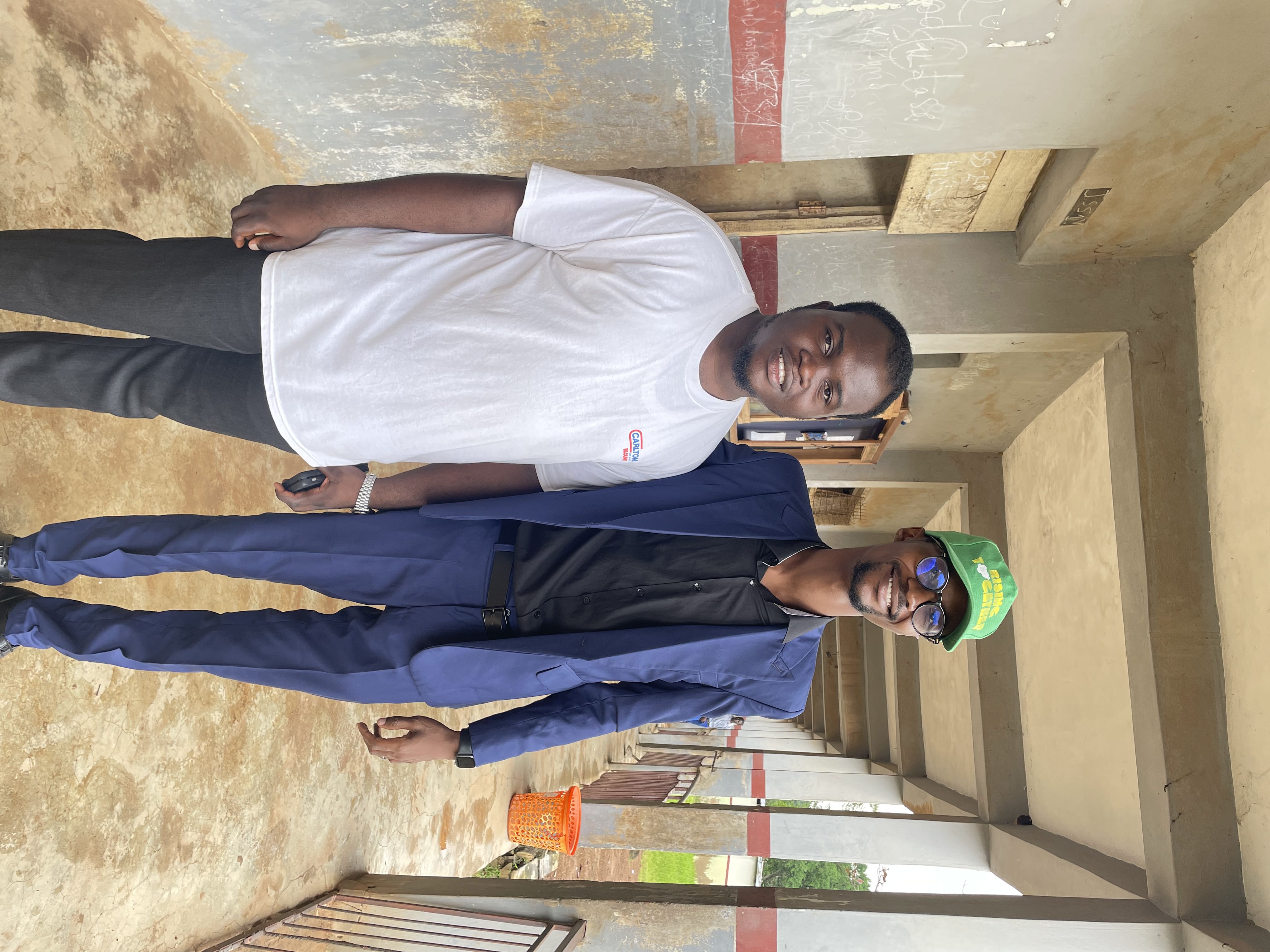 Foundation representative and a school official during a site visit in Ibadan