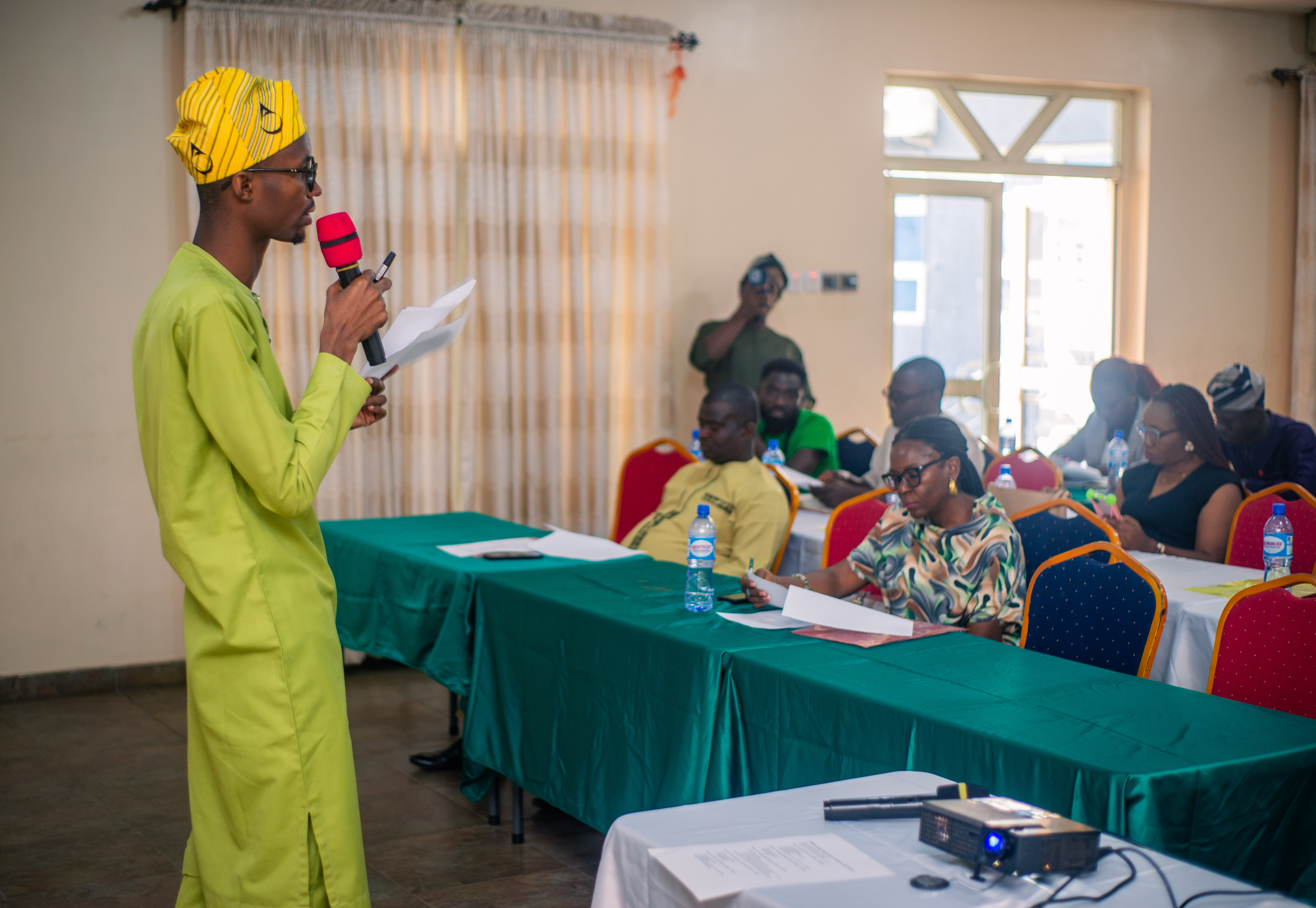 Foundation representative speaking at a formal civic gathering